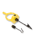 Loon Gator Grip Dubbing Spinner in yellow with a circular handle, a black clip, and two small detachable black components designed for fishing tackle use.