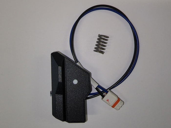 Lowrance Ghost Button, Front Left Kit 000-15310-001 showing a black plastic button module with attached wiring and a small metal spring, used as a marine electronics accessory.