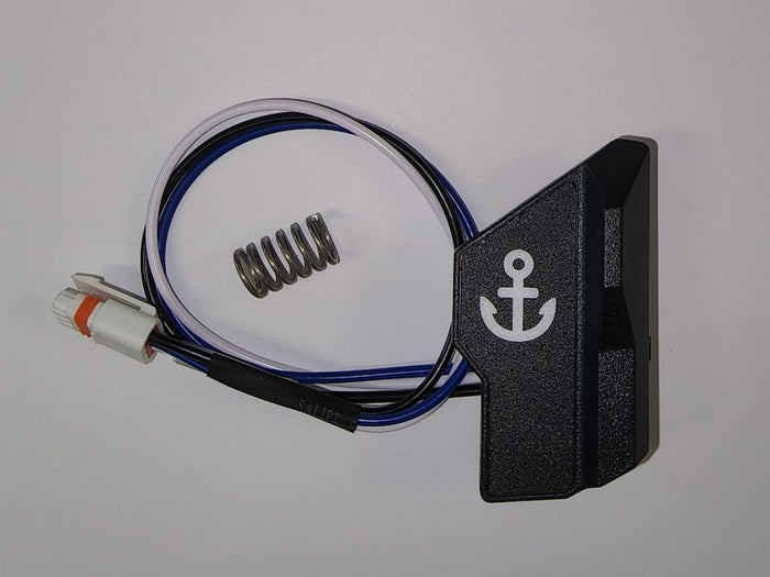 Lowrance Ghost Button, Front Right Kit 000-15311-001 showing a black textured plastic button with an anchor symbol, attached wiring, and a small metal spring for marine electronics.
