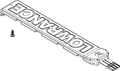 Lowrance Ghost Center Cover Kit 000-15319-001 featuring a rectangular, detailed cover panel with raised "LOWRANCE" lettering and an accompanying small screw for attachment.