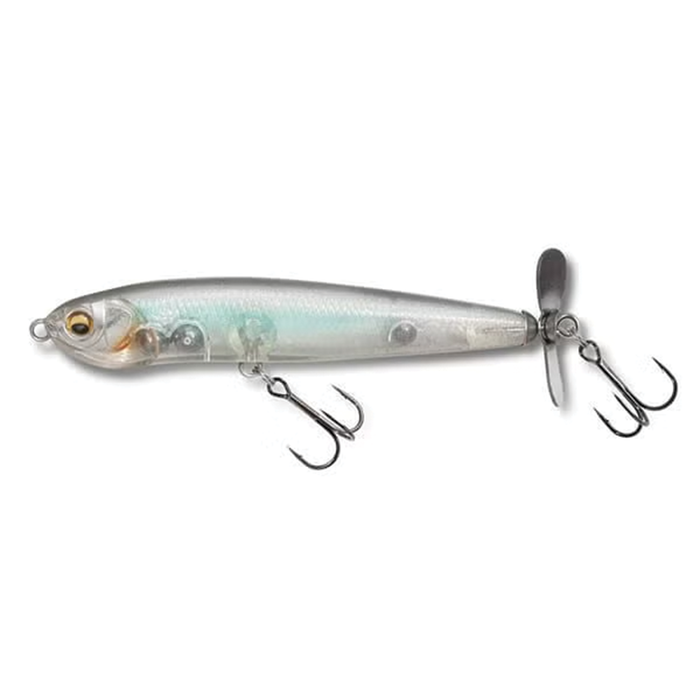 Megabass Karashi Spinner fishing lure with a sleek, translucent blue and silver body, featuring two sharp treble hooks and a rear metal spinner blade for added attraction.