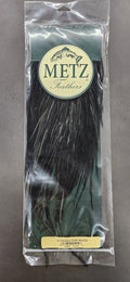 Metz #2 Rooster Saddle in black, long feathers packaged for fly fishing tackle and lure tying, suitable for custom fishing rods and musky tackle.