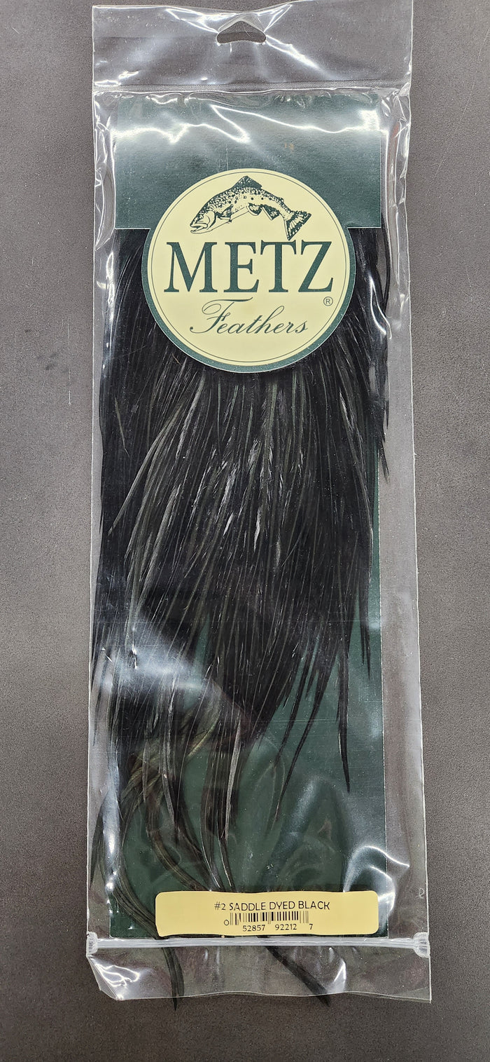 Metz #2 Rooster Saddle in black, long feathers packaged for fly fishing tackle and lure tying, suitable for custom fishing rods and musky tackle.