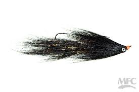 Black and orange MFC Jig Gangalf fishing lure featuring a sleek, elongated design with synthetic fibers and a sharp hook, designed for musky fishing tackle.