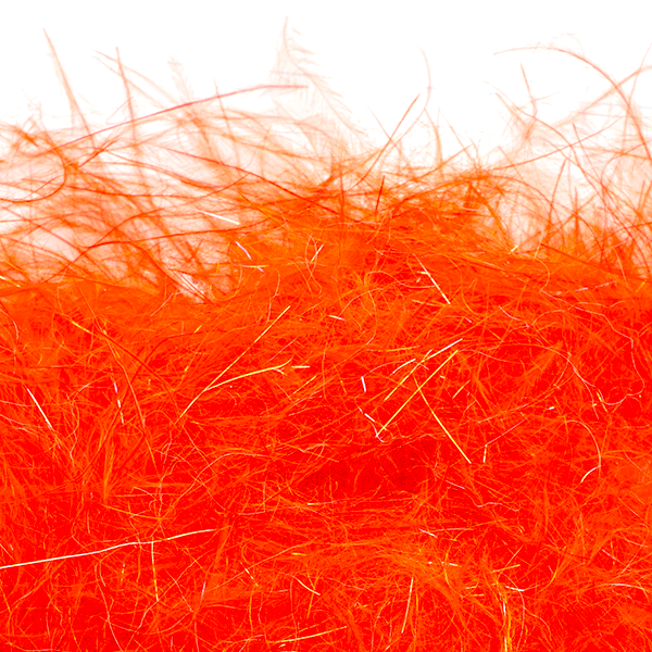 Bright orange fine synthetic fibers of MFC Senyo's Dirty Bird Dubbing used for tying fishing lures, adding texture and color to fishing tackle.