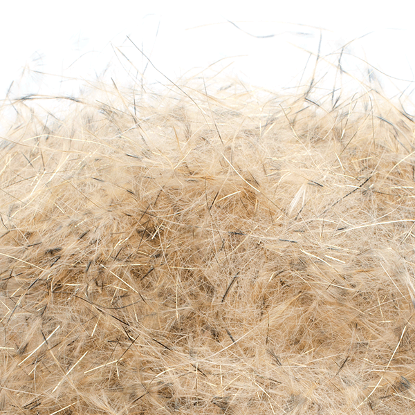 Close-up image of tan and gold synthetic dubbing fibers used for fly fishing, showcasing MFC Senyo's Dirty Bird Dubbing with fine, wispy texture ideal for creating fishing lures.
