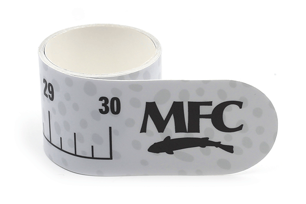 Rolled white measuring tape featuring black markings and numbers, with Mfc Sticker 30' Ruler branding and fish silhouette on the end, designed for fishing tackle use.