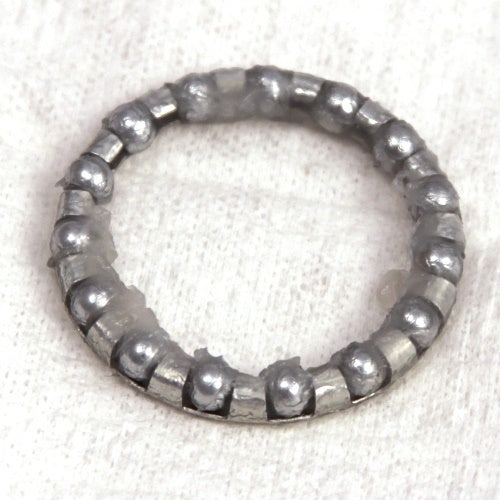 Minn Kota BEARING BALL-STEEL [B066 P/N: 2266000 is a small circular steel bearing ball assembly with evenly spaced ball bearings held by a metallic ring, designed for smooth mechanical movement.