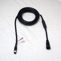 Minn Kota Cable, Int MSI - Instinct PN:490634-1 shows a coiled black marine cable with connectors on both ends, designed for secure and reliable marine electronic connections.