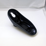 Minn Kota CONTROL BOX P/N: 2292500, a black, streamlined control box designed for marine electronics, featuring a smooth surface and ergonomic shape for easy installation in fishing boats.
