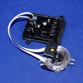 Minn Kota CTRL BD ASY,CMP NH &INSTR(N/A) P/N: 2884100 electronic assembly with black plastic housing, clear circular gauge, and attached white ribbon cables on a blue background.