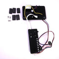 Minn Kota PCB ASM,TALON,HEAT SHRINK(N/A) P/N: 2884045 showing black electronic circuit boards with connected colored wires, buttons, and small black heat shrink tubing pieces and screws on a white background.