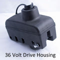 Black plastic motor housing unit with mounting hardware and electrical cable, identified as Minn Kota STEERING HSG ASSY 36V FW P/N: 2997025 for marine electronics applications.