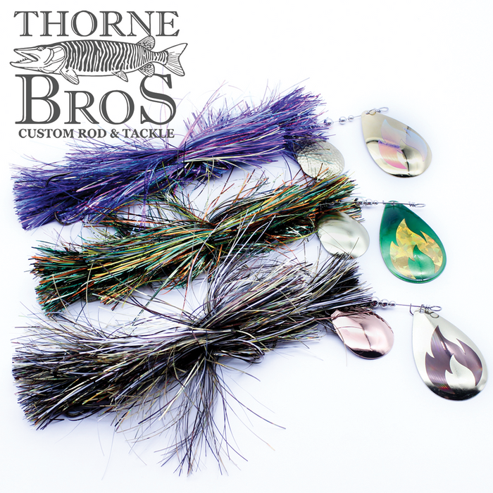 Musky Addicts Double Barn Burner 10/8C fishing lures featuring vibrant, multi-colored synthetic fibers with reflective metal spinner blades designed for musky fishing tackle.