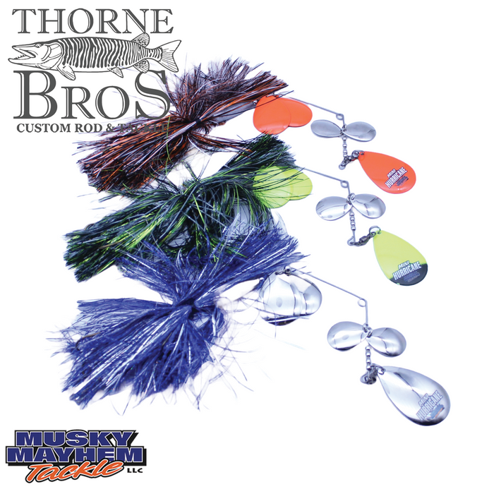 Three colorful Musky Mayhem Mini Hurricane fishing lures with shiny metal spinner blades and vibrant skirts in orange, green, and blue designed for musky fishing.
