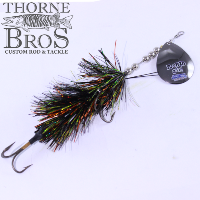 Musky Mayhem Rabid Girl 8" - Single Blade fishing lure with a black and iridescent tinsel body, silver bead chain, and single black blade designed for musky fishing.