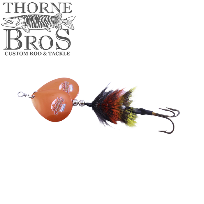 Musky Mayhem Rabid Squirrel 5" - Double Blades fishing lure with orange double spinner blades, black and orange feathered tail, and sharp treble hook for musky fishing.