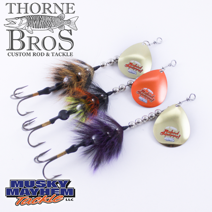 Three Musky Mayhem Rabid Squirrel 5" - Single Blade fishing lures with multi-colored feathered hooks and metallic spinner blades in gold and orange, designed for musky fishing.