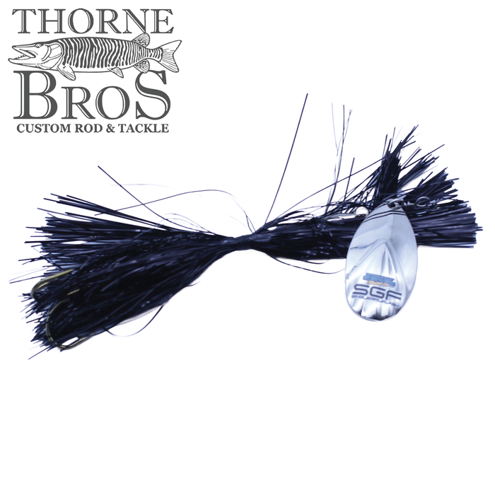 Musky Mayhem Single Girl Flash fishing lure with black skirt and silver spinner blade featuring S.G.F. engraving, designed for musky fishing by Thorne Bros.