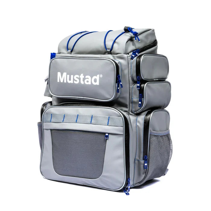 Mustad Game Time Backpack in gray with blue accents, featuring multiple zippered compartments and mesh pockets designed for organized fishing tackle storage.