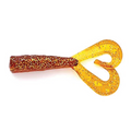 Soft plastic fishing lure in brown and translucent orange with glitter, designed with twin curled tails, Mutiny Baits Assassin Shrimp Tail for fishing tackle.