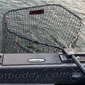 Net Buddy Musky Buddy Net attached to a boat, featuring a large, deep black mesh net designed for catching musky fish in open water.