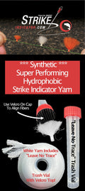 Close-up of New Zealand Strike Indicator Synthetic Yarn in white with a Velcro cap for fiber alignment, accompanied by a clear "Leave No Trace" trash vial with a red screw top, designed for fishing tackle use.