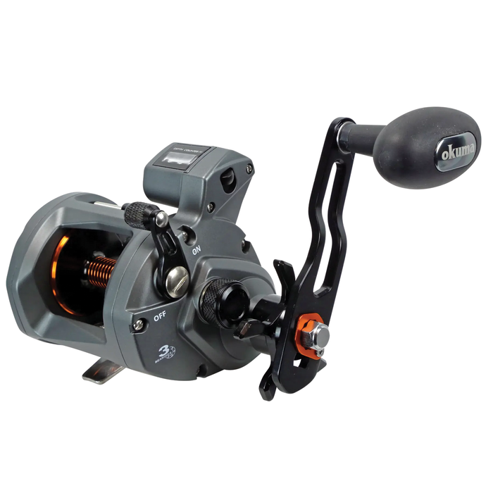 Okuma Coldwater "A" Linecounter fishing reel in gray and black with ergonomic handle, digital line counter, and metal spool, designed for precision in fishing tackle.