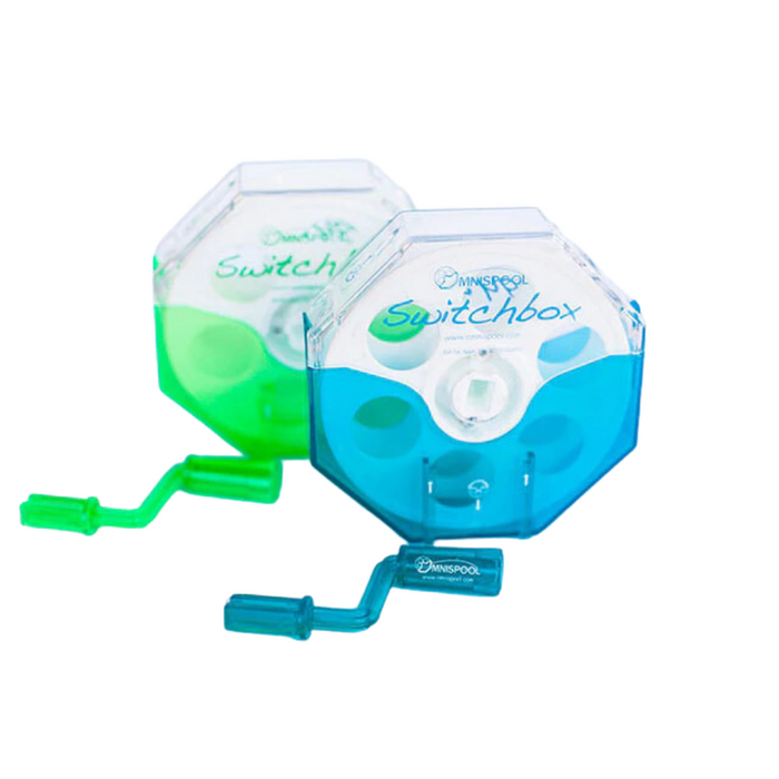 Two Omnispool fishing reels in blue and green, featuring clear casing and ergonomic handles, designed for easy use with fishing tackle and rods.