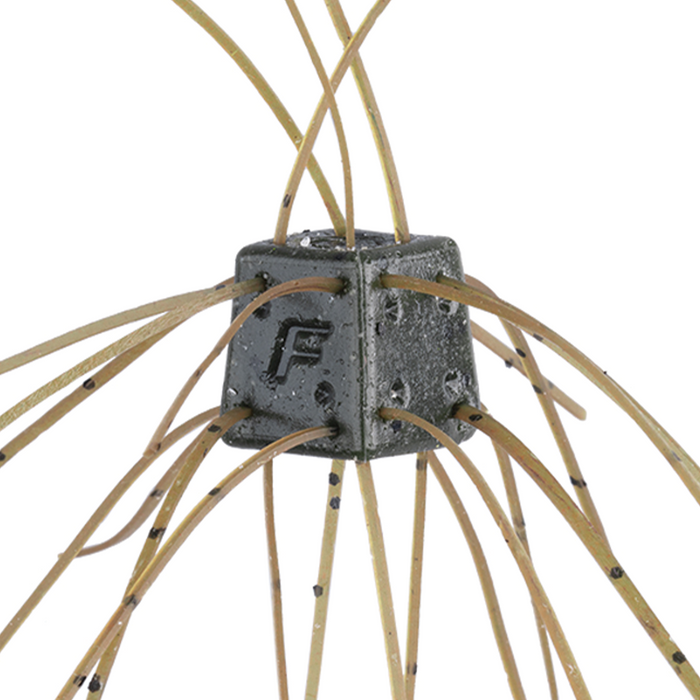 Close-up of the OSP Saikoro Rubber - Max Salt fishing lure showing a textured, cube-shaped body with multiple flexible rubber strands extending outward in tan color with black speckles.
