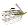 Outkast Tackle Pro Swim Jig featuring a detailed fishing lure with a yellow-green head, black striped skirt, and a sharp black hook, designed for effective fishing tackle use.