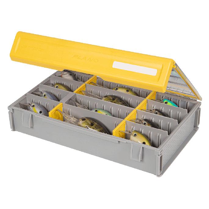 Plano EDGE 3700 Deep Box fishing tackle organizer with a yellow lid and adjustable gray compartments holding various fishing lures for easy storage and access.