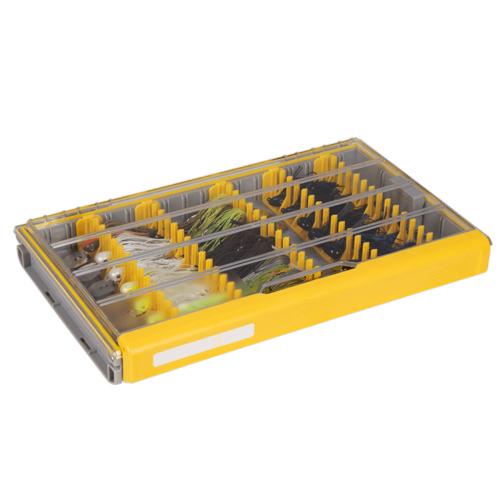 Plano EDGE Jig Box with a clear lid and yellow edges, featuring multiple compartments organizing various fishing lures and tackle for efficient fishing gear storage.