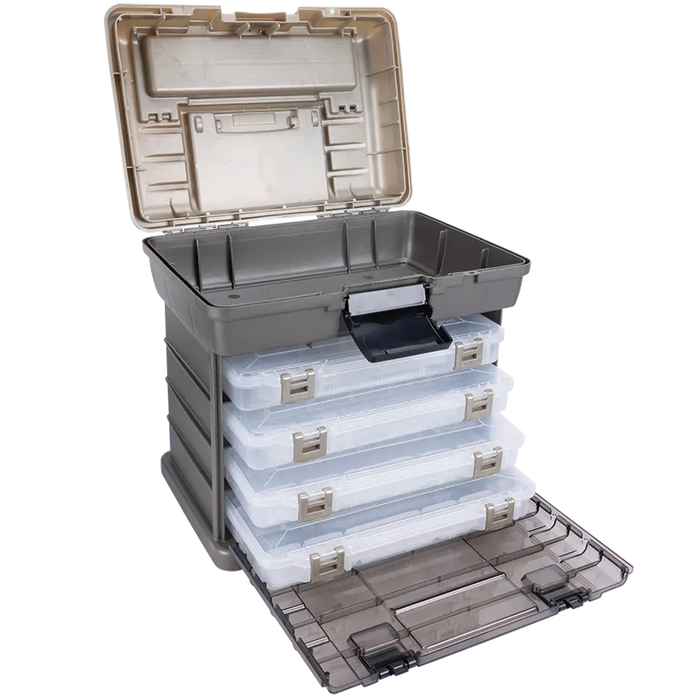 Plano Guide Series Stowaway Rack System with durable brown plastic body, four clear transparent lure boxes with metal latches, and an open top compartment for fishing tackle organization.