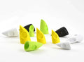 Various colored Rainy's Bisharat's Pole Dancer Foam Head fishing lure components in white, black, yellow, and green displayed on a white background, designed for musky fishing tackle.