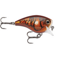 Rapala BX Brat fishing lure designed with realistic fish scale patterns in brown and orange tones, featuring two treble hooks and a clear plastic lip for diving action.