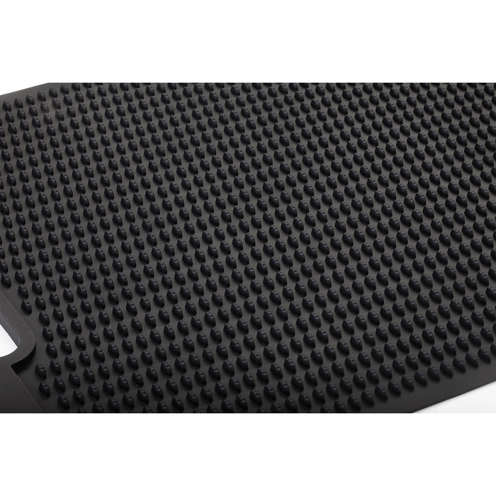 Close-up of a black Rapala Fillet Mat featuring textured raised bumps on its surface for securely holding fish in place during filleting, designed for fishing tackle use.