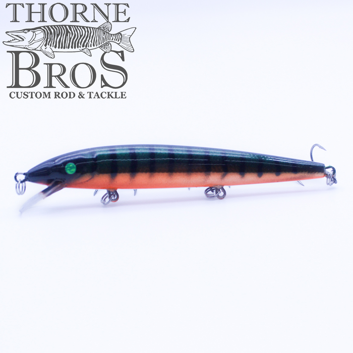 Rapala Husky Jerk - Custom Painted Colors fishing lure with a sleek, elongated body featuring green and orange tones, designed for musky fishing and available from Thorne Bros.