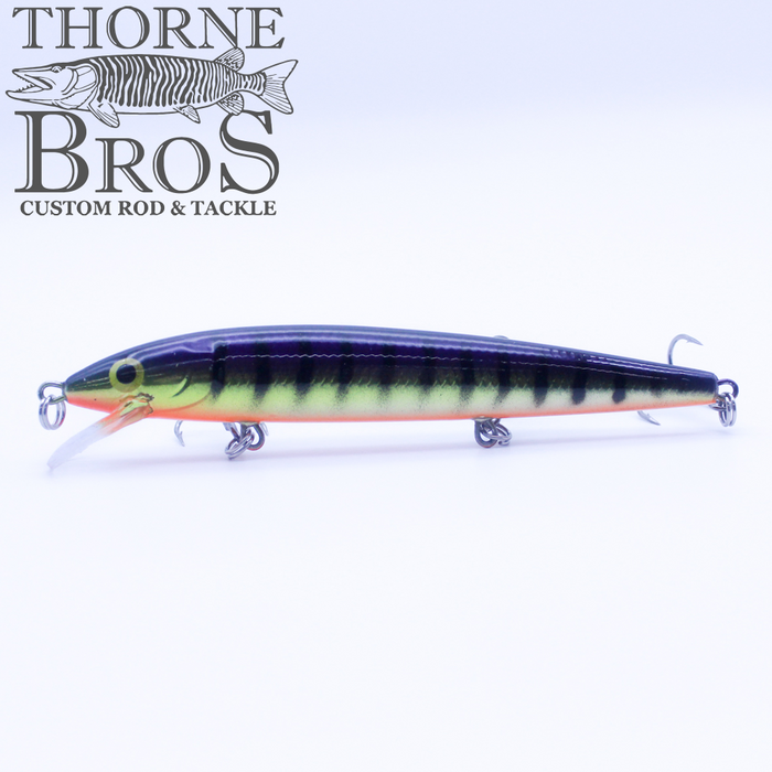 Rapala Husky Jerk - Custom Painted Colors fishing lure with a striped yellow and black pattern, detailed eyes, and multiple treble hooks designed for musky fishing.