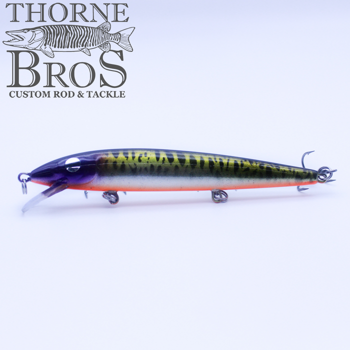 Rapala Husky Jerk - Custom Painted Colors fishing lure with a detailed yellow and black striped design, three treble hooks, and a diving lip, displayed against a white background.