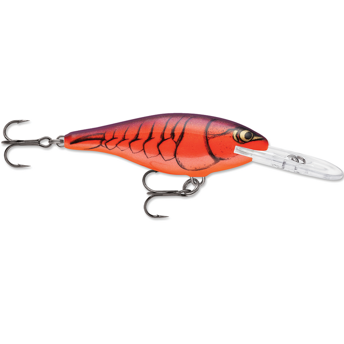 Rapala Shad Rap fishing lure in bright orange and red with black scale pattern, featuring a clear diving lip and two treble hooks for effective fishing tackle use.