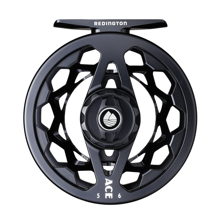 Black Redington Ace Fly Reel with a lightweight, ventilated spool design, featuring a central drag adjustment knob and a sleek matte finish, ideal for fly fishing tackle.