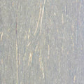 Close-up of shimmering white synthetic fibers with subtle iridescent strands, showing the texture and detail of the Renzetti Sculpting Flash Fiber used for fishing tackle and lure crafting.