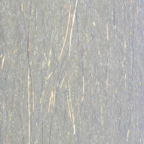 Close-up of shimmering white synthetic fibers with subtle iridescent strands, showing the texture and detail of the Renzetti Sculpting Flash Fiber used for fishing tackle and lure crafting.