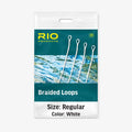 Clear plastic package containing white Rio Braided Loops in various sizes with a water background, labeled with size regular and brand logo for fishing tackle use.