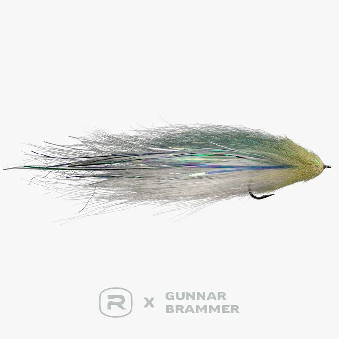 RIO Brammer Imposter 6/0 is a detailed fishing lure featuring layered synthetic fibers in muted natural tones with iridescent strands, designed for freshwater musky fishing.