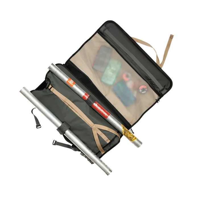 Riversmith Convoy Gear-Roll open to reveal organized compartments with fishing tackle and gear, designed for secure storage and easy transport of fishing rods and accessories.