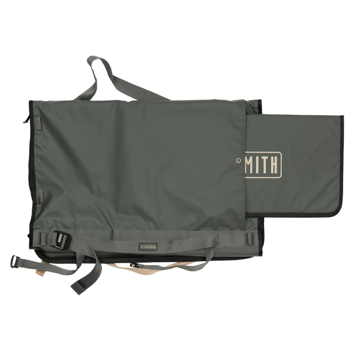 Riversmith Convoy Gear-Roll in dark olive green fabric, designed for organized storage and easy transport of fishing tackle and gear with sturdy straps and protective padding.