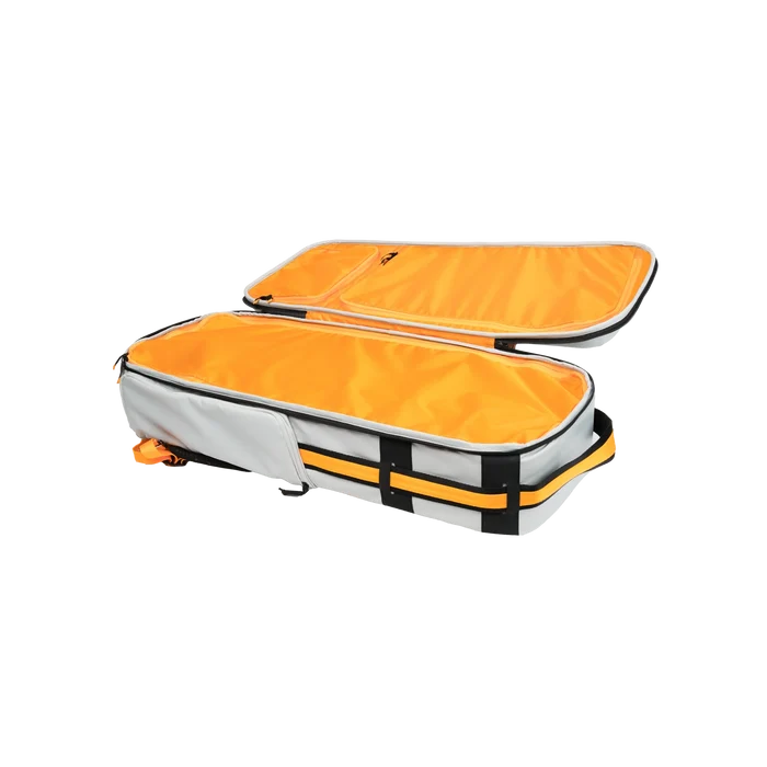 Riversmith Convoy Travel Pack open to show bright orange interior compartments, designed for organized storage of fishing rods and tackle.