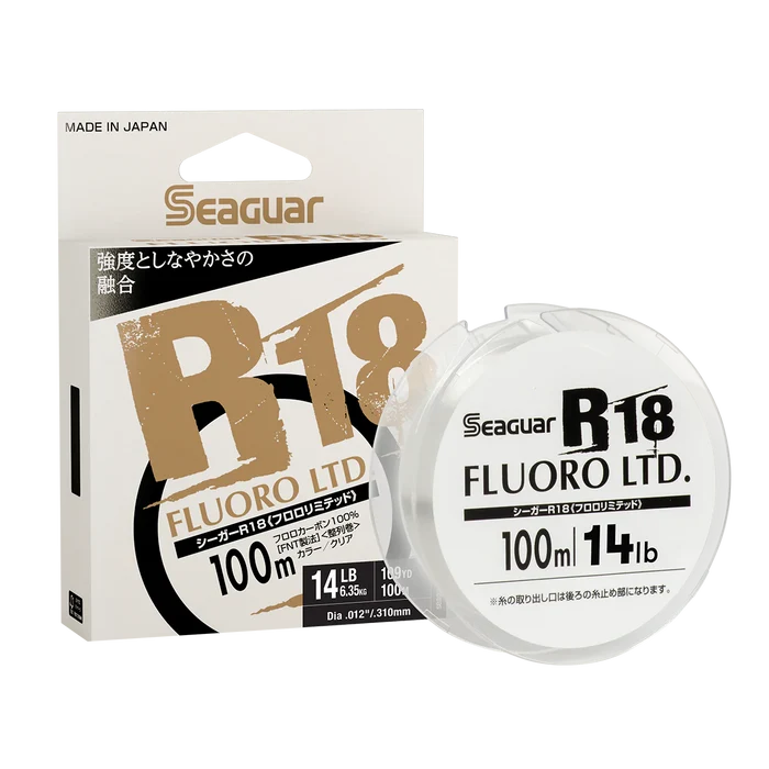 Seaguar JDM R18 Fluorocarbon fishing line spool and packaging showing 100 meters length and 14-pound test strength, designed for precision fishing tackle use.